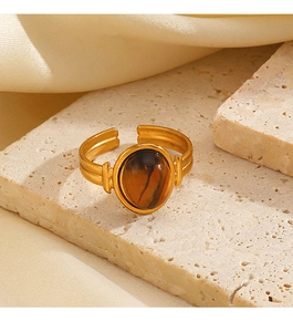 Macro di anello con occhio di tigre ovale e fascia dorata scanalata in stile vintage