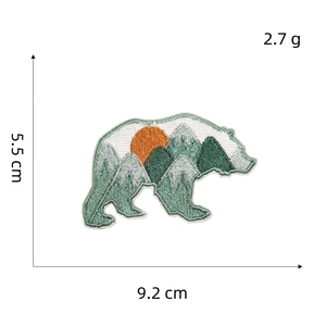 Outdoor bear patch detail showing 9.2cm width and mountain embroidery pattern