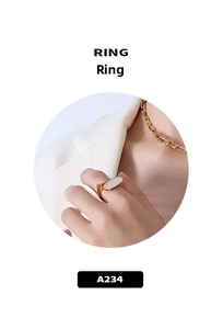 Close-up of elegant 18k gold plated cat's eye stone ring on finger, model A234