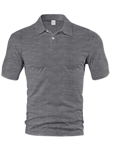 Close-up of grey short sleeve polo shirt showing the textured faux linen checkered knit fabric