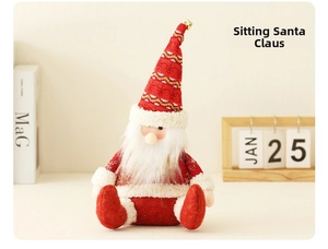 Detailed view of a sitting Santa gnome plush with a red knitted hat and white beard