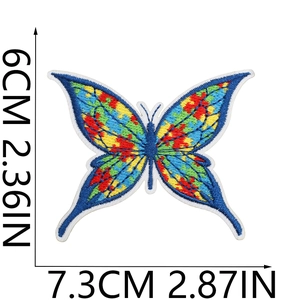 Close-up of colorful puzzle piece butterfly embroidery patch with size 7.3x6cm dimensions