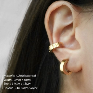 Close-up of gold stainless steel ear cuff on ear with width and size specifications