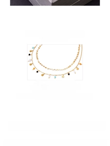 Close-up of double layer titanium steel necklace with colorful beads and star pendant