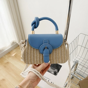 Blue leather and beige straw woven handbag with knotted handle and rope strap for summer