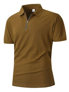 Close-up of mustard yellow men's polo shirt featuring waffle knit texture and zipper collar