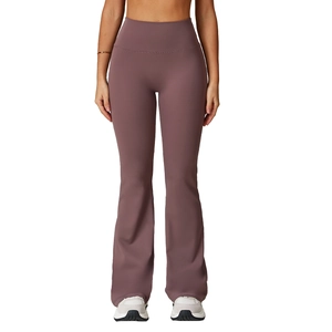 High-waisted dusty pink flare yoga pants featuring tummy control and slim fit design