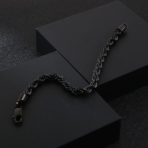 Detail of 6mm black twisted rope chain bracelet in stainless steel with lobster clasp