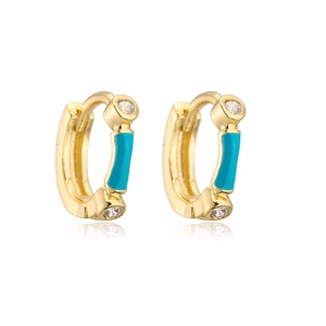 Close-up of gold-plated hoop earrings with blue enamel stripes and zircon accents