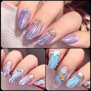 3D ocean shell almond press-on nails with pearls and sea charms in iridescent colors