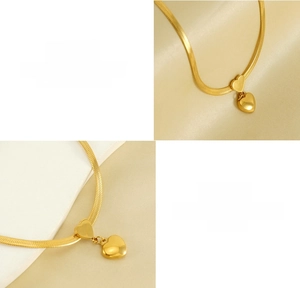 Detail of 18K gold-plated titanium steel double heart pendant on a sleek snake chain