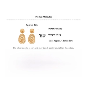 Detail view of gold shell earrings showing 4.5cm x 2cm dimensions and silver needle material