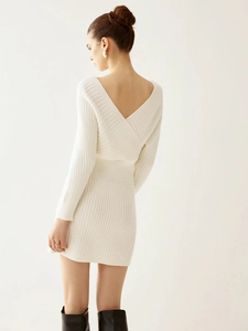 Elegant white knitted mini dress featuring a stylish backless cross V-neck design