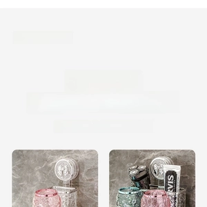 Detail of wall-mounted metal holder with colorful glass tumblers for bathroom storage