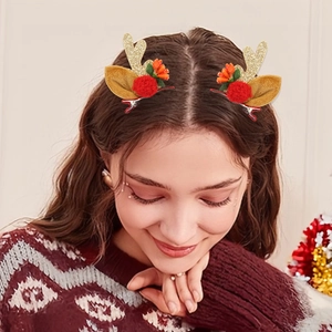 Christmas reindeer antler hair clips with gold glitter ears and red pompom for holiday party