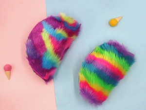 Detailed top view of rainbow plush half-round pencil case with soft faux fur texture