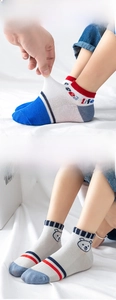 Detailed macro view of mesh breathable fabric and reinforced toe of children socks