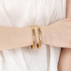 Luxurious 18K gold plated titanium bangles set with sparkling crystals for women