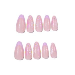 Glossy almond press-on nails with purple French tips and fresh daisy floral designs