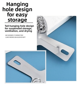 Detail of stainless steel cocktail strainer handle with hanging hole for easy storage