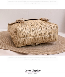 Detail of woven straw backpack with beige leather buckle and gold metal hardware