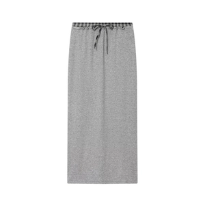 Detail of grey knitted midi skirt with black and white checkered waist and drawstring
