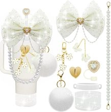 Detail of white glitter bow charm with pearl chain and silicone boot for tumbler