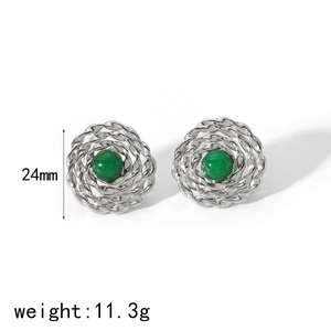 Detail of silver spiral stud earrings with green gemstones including size and weight specs