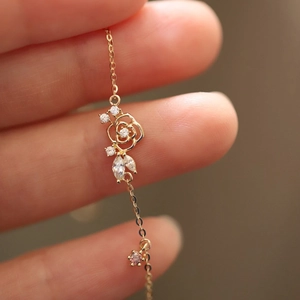 925 silver 14K gold plated bracelet with rose motif and purple zircon accents
