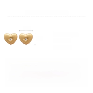 Detail view of golden brushed heart earrings with zircon inlay and product specifications