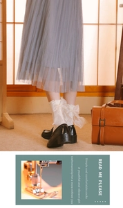 White frilly socks with large organza bow detail and wavy lace edges for a sweet style