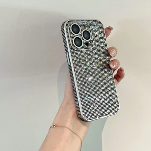 Macro detail of sparkly rhinestone texture and metal frame on the iPhone 17 case