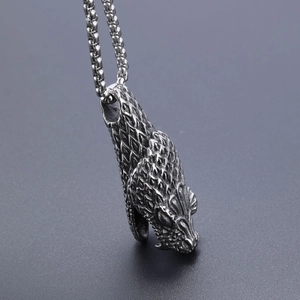 Vintage stainless steel dragon head pendant necklace with textured scales and long chain