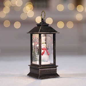Vintage bronze Christmas LED lantern with snowman and pine tree scene, holiday decor