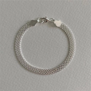 Minimalist 925 sterling silver woven mesh bracelet with polished lace texture