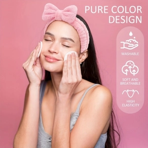 Doux bandeau nœud rose pour femmes, bandeau de maquillage et spa confortable avec haute élasticité.