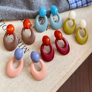 Vintage acrylic oval hollow pendant earrings set in multiple retro color combinations