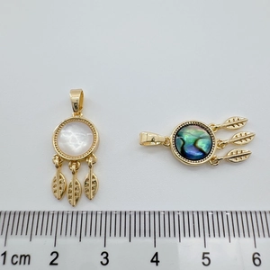 18K gold-plated shell pendants with leaf charms on a white background with a ruler