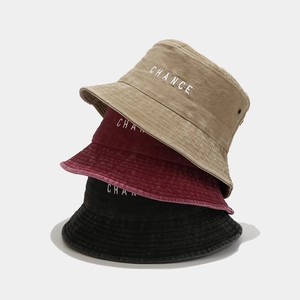 Corduroy bucket hats with CHANCE embroidery in khaki, burgundy, and black for sun protection