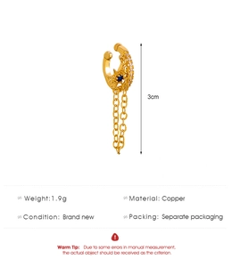 Details von Gold-Ohrklemme mit Stern, blauem Zirkon, Kupferkette und 3 cm Länge