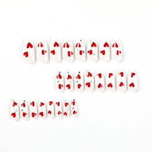White and red heart press-on nails with silver rhinestones, 30 pieces set on white background