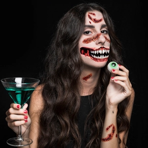 Scary Halloween temporary tattoo with realistic bloody scars and wide monster mouth makeup