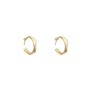 Minimalist geometric C-shaped gold hoop earrings with polygonal faceted metal design