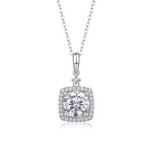 Macro shot of square S925 sterling silver pendant with round main stone and halo diamonds