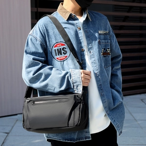 Minimalist black waterproof crossbody messenger bag for men in a stylish urban look