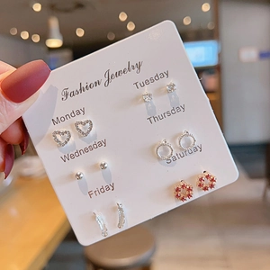 Detailed view of 6-pair silver stud earring set featuring hearts and butterfly shapes