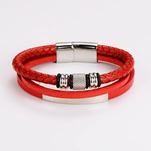 Detail of red multilayer leather bracelet featuring woven cord and silver magnetic clasp
