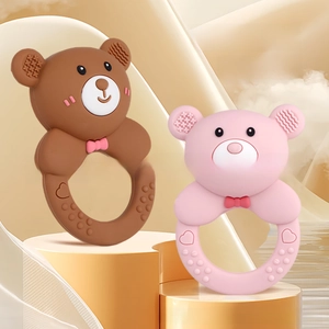 Close-up of bear-shaped silicone baby teethers with massage bumps for soothing gums