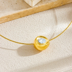Gold-plated stainless steel necklace with sparkling round diamond-set ingot pendant