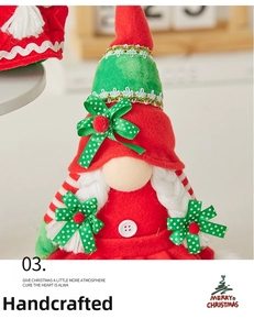 Detail of a Christmas gnome doll with white braids and red hat featuring green polka dots